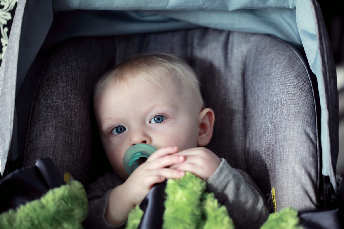 Child in infant car seat